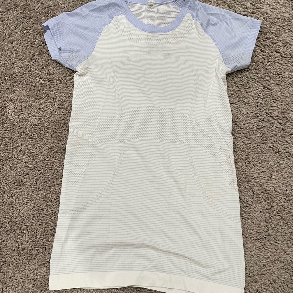 Lululemon Size 4 Short Sleeve Shirt (purple/lilac and white)